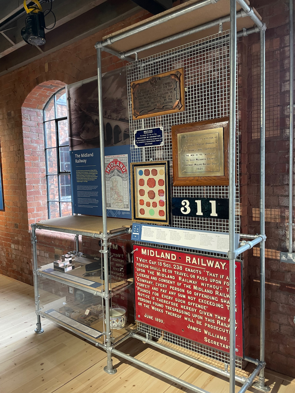 A view of the displays in the Railways Revealed gallery of the Museum of Making in  Derby's Silk Mill. The plaque to Newton Hibbert is on prominent display