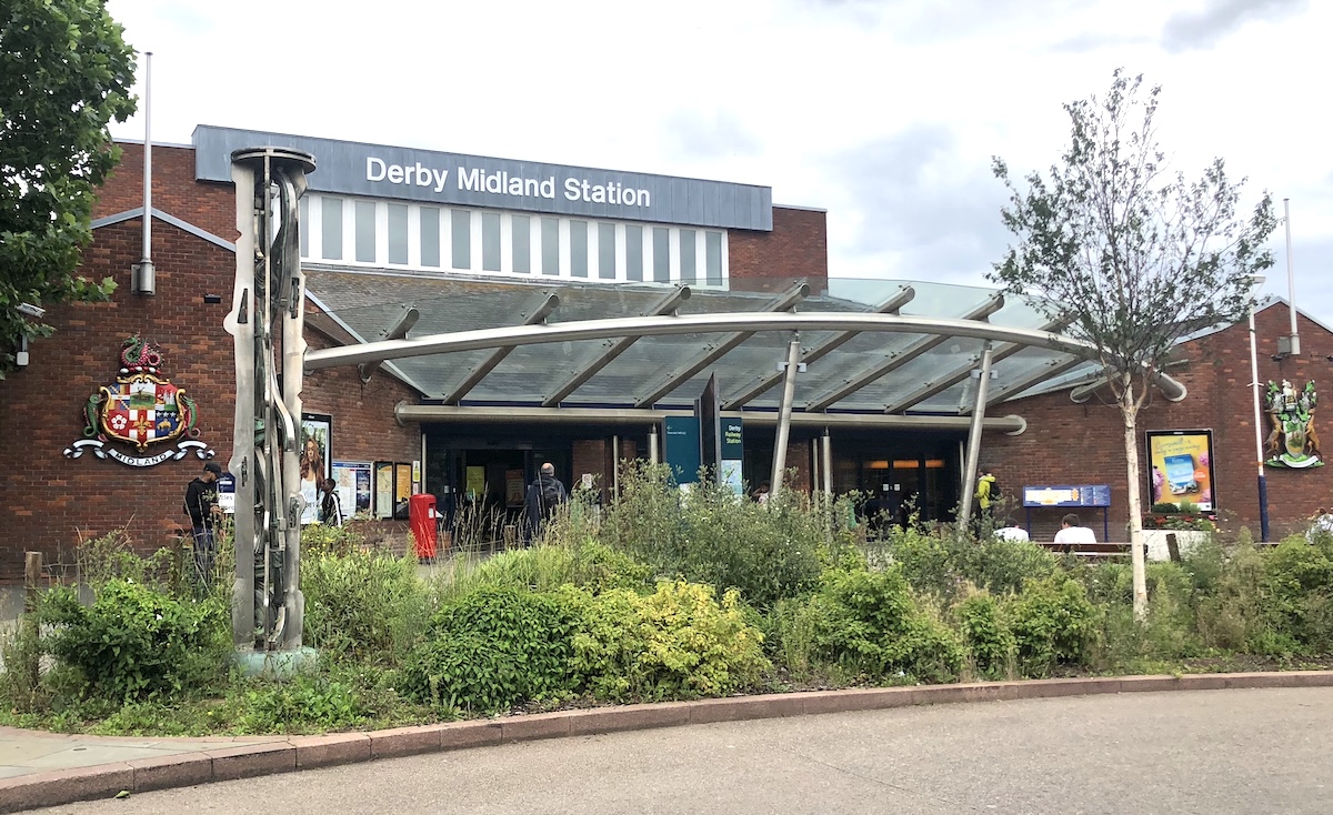 The frontage of Derby Railway Station seen from the area of the bus stops.