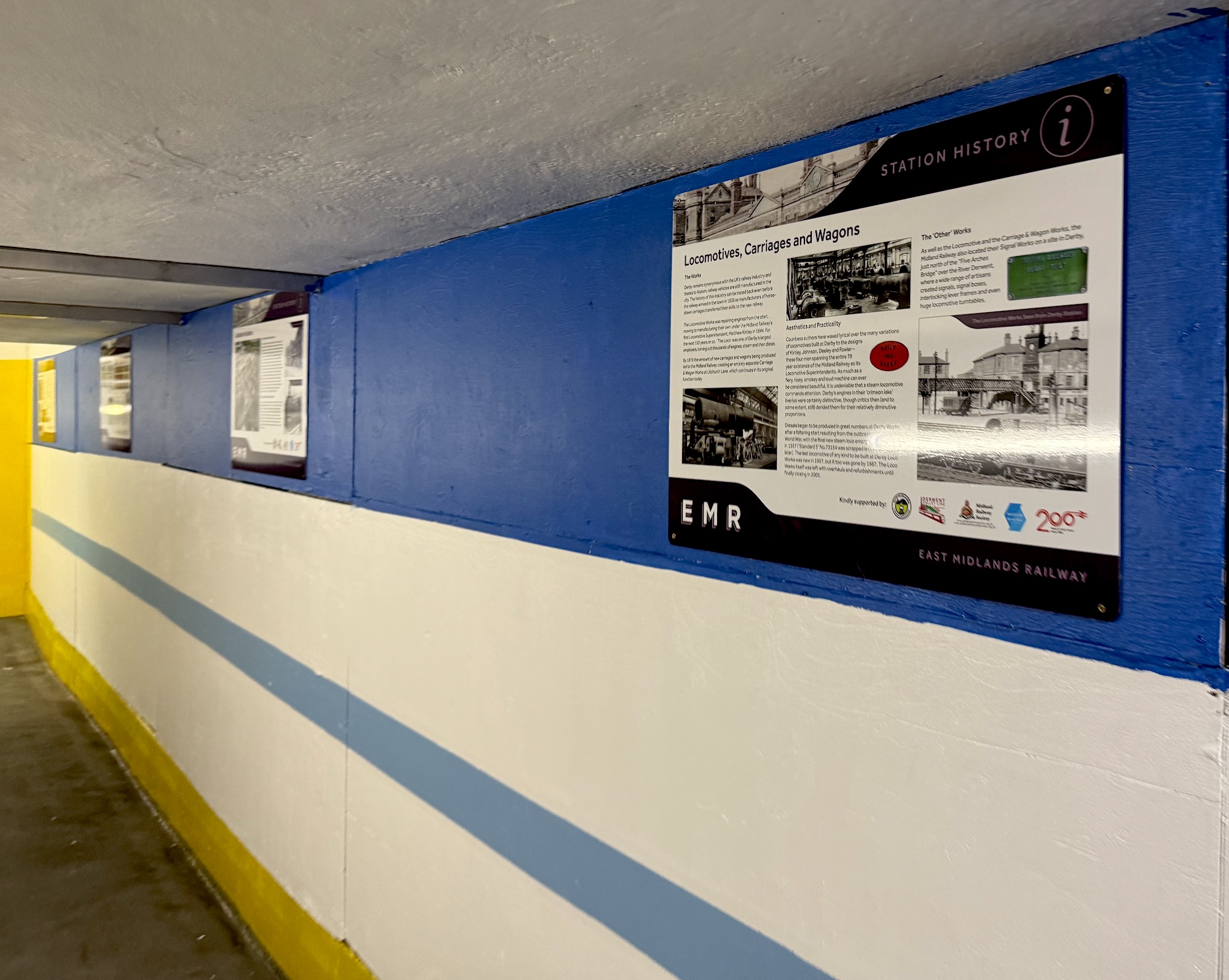 A view of the station history panels installed in the subway of Derby railway station authored by the Midland Railway Society using Midland Railway Study Centre resources