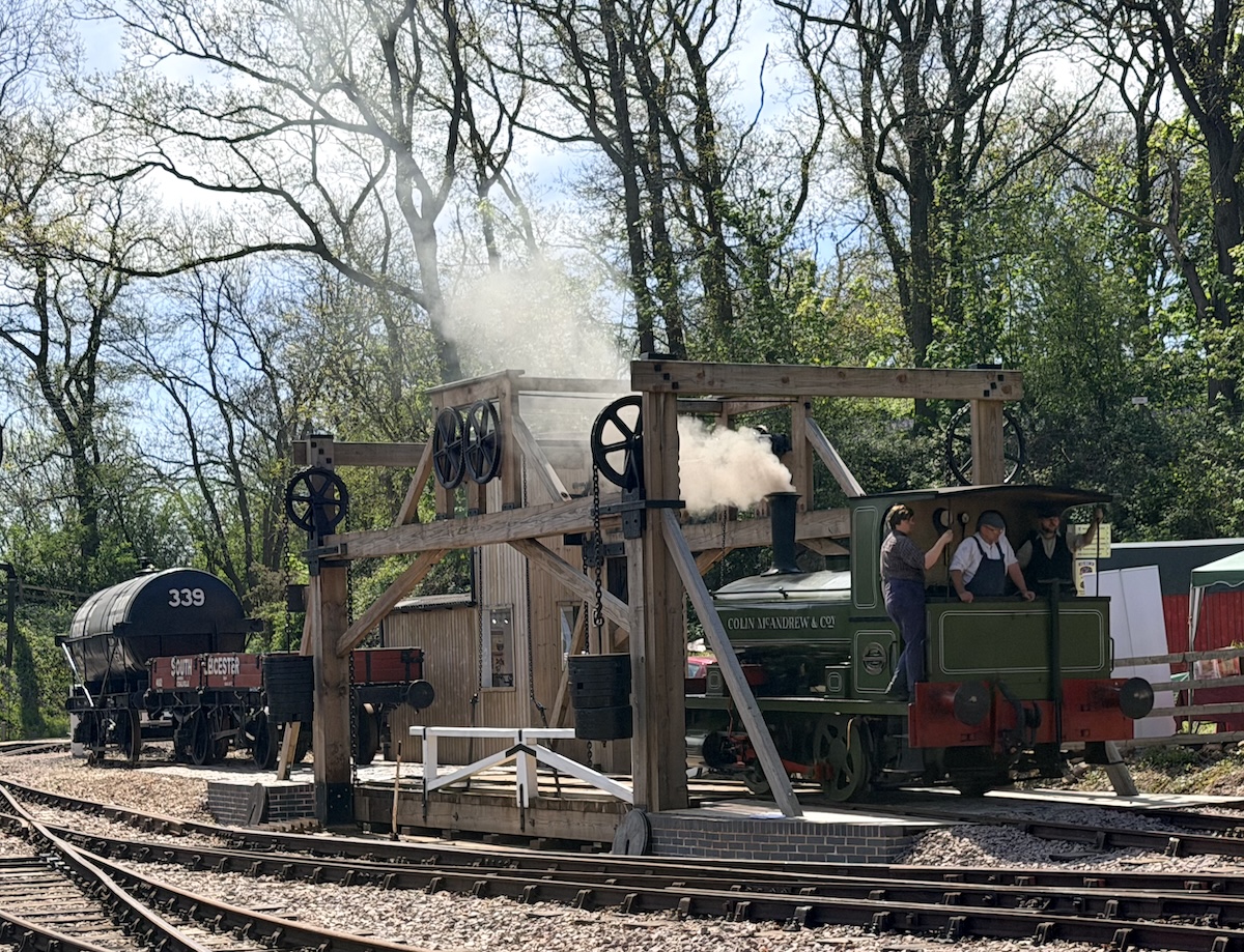A steam locomotive crosses the newly reinstalled lifting bridge at Mountsorrel Heritgae Centre.