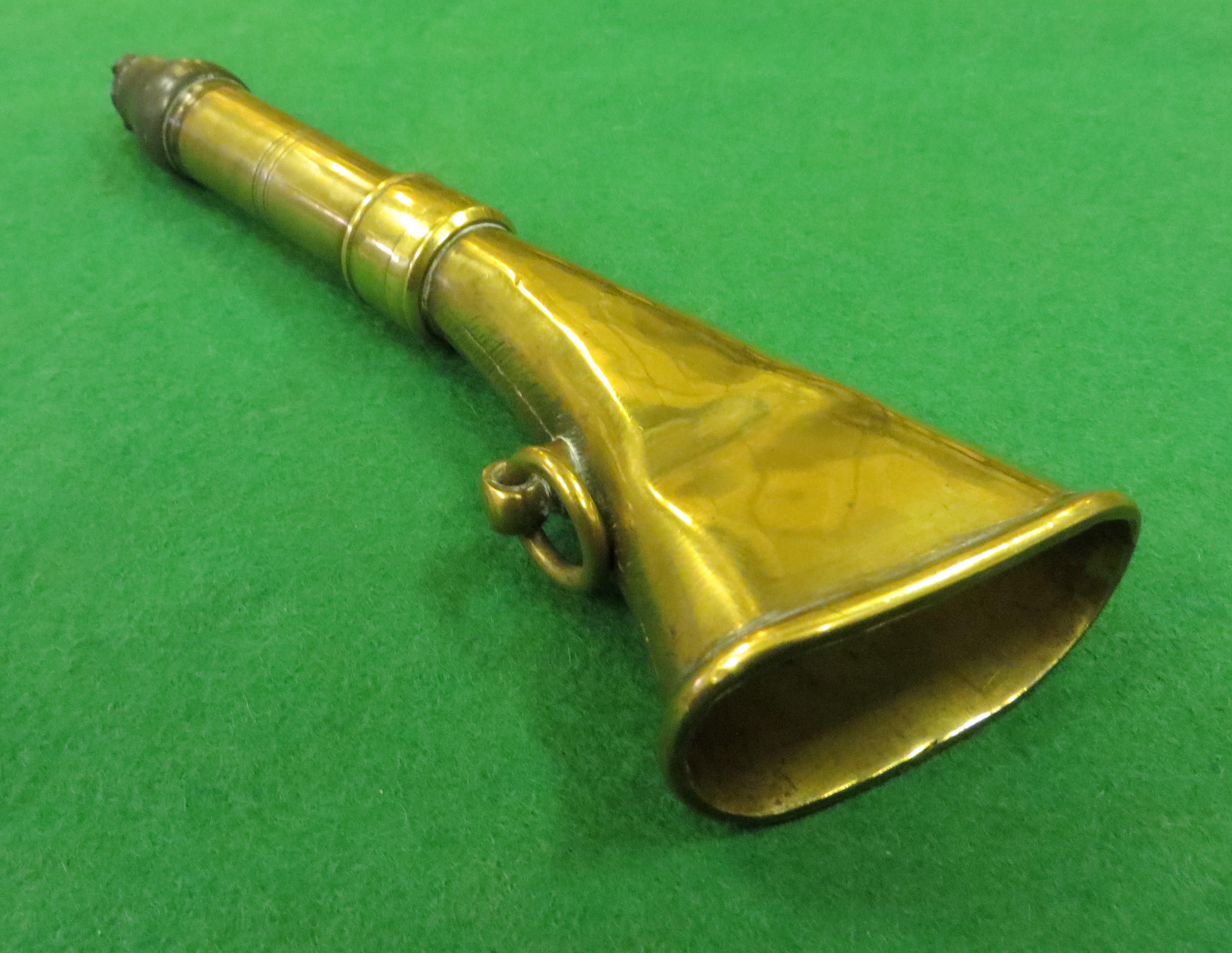 Another viewe of the small brass horn from a different angle